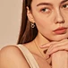 Gold Tone Interlocking Oval Link Baguette Zircon Drop Earrings